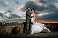 Bride and groom posing at their wedding held at Lympne Castle for their Kent wedding photographer