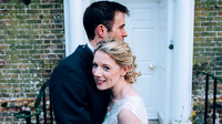 Bride and groom cuddling at their wedding at Swarling Manor